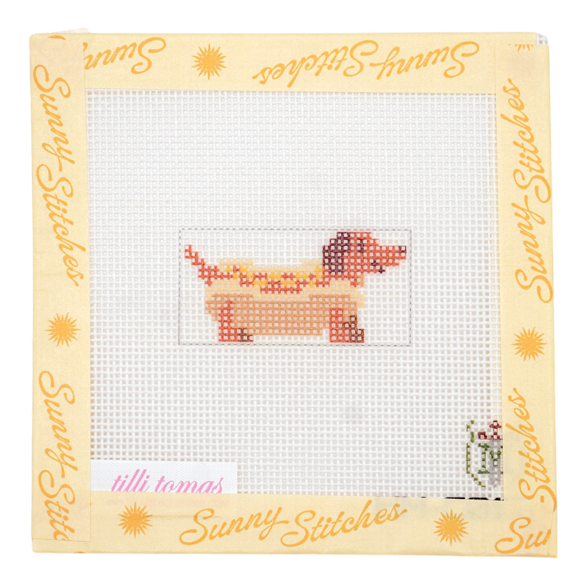 A completed cross-stitch design on white Aida canvas, featuring a dachshund dog in shades of orange, red, and brown. The canvas is framed by a decorative border printed with the brand name 'Sunny-Stitches' in orange script and sun motifs.